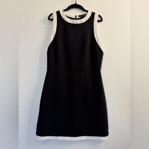 Classic elegant black dress with white trim